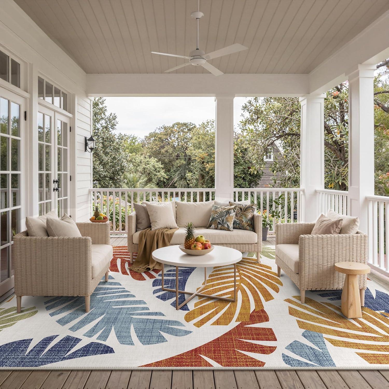 imageGENIMO Outdoor amp Indoor Area Rug 5x8 Waterproof NonShedding Easy Cleaning Leaf Mat for Patio Living Room Balcony Dining Room RV Deck Bedroom Camping Outside Carpet Tropical RustLeaf Rust Navy