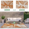 GENIMO Waterproof Outdoor Rug 5′ x 8′ for Patio Decor, Reversible Plastic Straw Area Rugs for Camping Clearance, RV Mat, Large Outside Carpet for Porch, Deck, Picni, Balcony, Garden, Black & Brown(Orange & White)