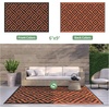 GENIMO Outdoor Rug for Patio Clearance, 5’x8′ Reversible Plastic Straw Rugs, Lightweight Waterproof RV Camping Mat for Camper, Balcony, Deck, Backyard, Picnic, BlackBrown(Black&orange)