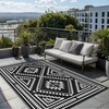 GENIMO Outdoor Rug for Patio Clearance, 5’x8′ Reversible Plastic Straw Rugs, Lightweight Waterproof RV Camping Mat for Camper, Balcony, Deck, Backyard, Picnic, BlackBrown(Black & White Aztec)