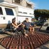 GENIMO Outdoor Rug for Patio Clearance, 5’x8′ Reversible Plastic Straw Rugs, Lightweight Waterproof RV Camping Mat for Camper, Balcony, Deck, Backyard, Picnic, BlackBrown(Black&orange)