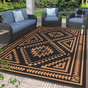 GENIMO Outdoor Rug for Patio Clearance, 5’x8′ Reversible Plastic Straw Rugs, Lightweight Waterproof RV Camping Mat for Camper, Balcony, Deck, Backyard, Picnic, BlackBrown(Black & Orange Aztec)