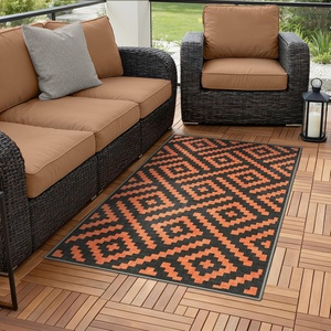 GENIMO Outdoor Rug for Patio Clearance, 5’x8′ Reversible Plastic Straw Rugs, Lightweight Waterproof RV Camping Mat for Camper, Balcony, Deck, Backyard, Picnic, BlackBrown(Orange & Noir)