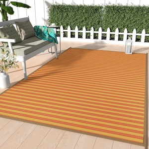 GENIMO Outdoor Rug for Patio Clearance, 5’x8′ Reversible Plastic Straw Rugs, Lightweight Waterproof RV Camping Mat for Camper, Balcony, Deck, Backyard, Picnic, BlackBrown(Orange)